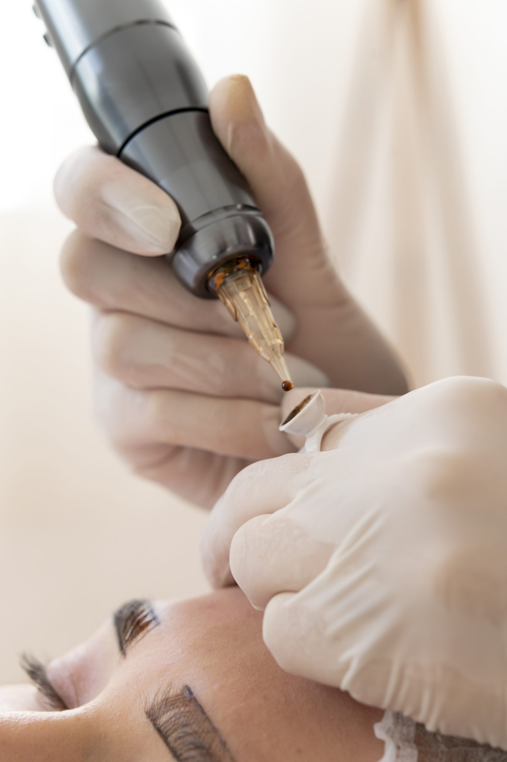 beautician doing microblading procedure client s eyebrows