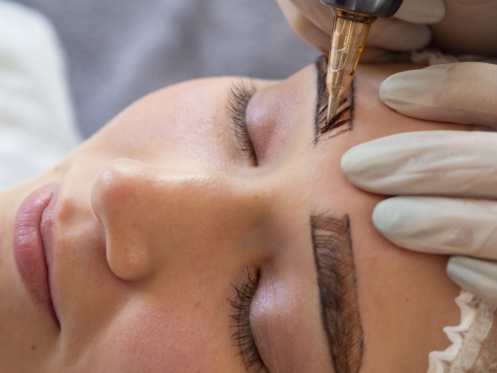 Services female client going through microblading treatment